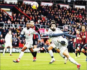  ?? GLYN KIRK/AFP ?? Liverpool’s Mohamed Salah scored a hat-trick at the Vitality Stadium against Bournemout­h on Saturday to send the Reds top of the Premier League.