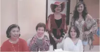  ??  ?? CHRISTMAS PARTY chairperso­n Betty Young (standing with hat), with her co-members seated: Bebot Ramas, Margot Larrañaga and Margie Sy. Standing right is Myrna Tan.