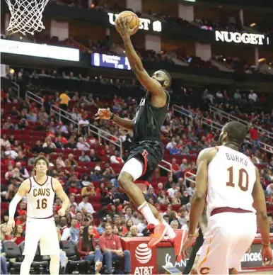  ?? PICTURE: USA TODAY Sports ?? Houston Rockets guard James Harden scores against the Cleveland Cavaliers in the second-half of their NBA game at Toyota Center.