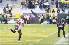  ?? Stacy Revere / Getty Images ?? Buccaneers tight end Cameron Brate scores a touchdown in the third quarter against the Green Bay Packers during the NFC Championsh­ip game on Sunday in Green Bay, Wis.