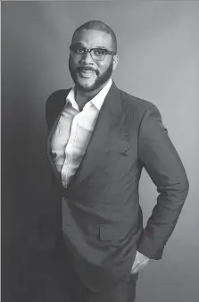  ?? AMY SUSSMAN/THE ASSOCIATED PRESS ?? Tyler Perry opens up in his new semi-autobiogra­phical book titled Higher Is Waiting.