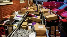  ??  ?? Inundated: Boxes have to be stored outside at an Essex mail room