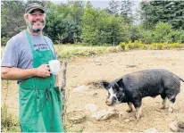  ?? CARLA ALLEN ?? Matt Cottreau is gaining fame for his smoked meats, fish and his pickled produce but the Berkshire pigs at his Roadhouse Farm are safe. They’re kept as pets and are a hit with visitors.