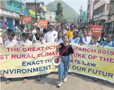  ??  ?? RIGHT
Licypriya Kangujam leads a climate strike in Odisha state of India in October 2019.