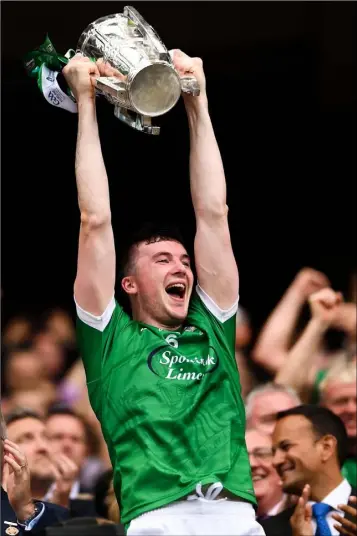  ??  ?? Limerick captain Declan Hannon lifts the Liam MacCarthy Cup.