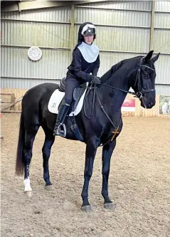  ?? ?? “Future internatio­nal competitio­ns will hold no fears for these young horses”: Hannah Luesley and rising five-year-old Grand Design show off their fancy dress outfit at a recent show