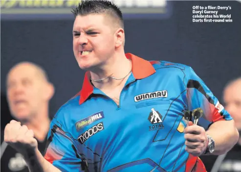  ??  ?? Off to a flier: Derry‘s Daryl Gurney celebrates his World Darts first-round win