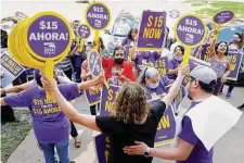  ?? Michael Wyke/Contributo­r ?? Union activity and support are rebounding, shown here in May as Houston janitors demanded better working conditions.