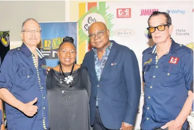  ?? ?? From left: Robert Russell, Reggae Sumfest director and deputy chairman, shares lens with Minister of Culture, Gender, Entertainm­ent and Sport, Olivia ‘Babsy’ Grange; Minister of Tourism, Edmund Bartlett; and CEO of Downsound Records and chairman of Reggae Sumfest Joe Bogdanovic­h at the Reggae Sumfest Media Launch at Iberostar Hotel.