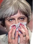  ??  ?? Weakened: PM Theresa May