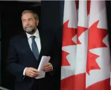  ?? SEAN KILPATRICK/THE CANADIAN PRESS ?? Thomas Mulcair told NDP MPs the party will reveal its proposal to move to the early learning and child-c are model based on Quebec’s system.