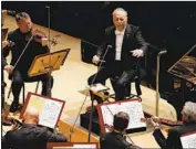  ?? Luis Sinco Los Angeles Times ?? ZUBIN MEHTA conducts the L.A. Philharmon­ic and pianist Yefim Bronfman on Thursday at Disney Hall.