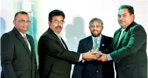  ??  ?? Tesman Antony Jude Maloney, the Founder, Managing Director and Chief Executive Officer of M I Synergy (Private) Limited receiving the award