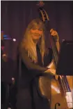  ?? PHOTO BY SCOTT CHERNIS ?? Ruth Davies’ ability to play blues, rock and jazz has made her an in-demand bassist for many A-list artists.