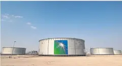  ?? REUTERS ?? Oil tanks at the Saudi Aramco oil facility in Abqaiq, Saudi Arabia.