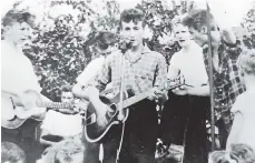  ??  ?? After performing a Liverpool concert with his band the Quarrymen, a 16-year-old John Lennon (center) would meet fellow skiffle fan Paul McCartney. They would later go on to form The Beatles.