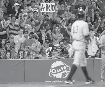  ?? JIM ROGASH/GETTY IMAGES ?? A Red Sox fan shows his feelings toward Alex Rodriguez of the New York Yankees after Rodriguez lined into a double play Friday in Boston. Rodriguez will play while awaiting an arbitrator’s decision on his appeal of a 211-game suspension.