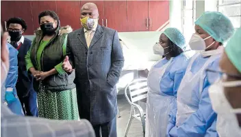  ?? Picture: EUGENE COETZEE ?? OFFICIAL VISIT: Eastern Cape premier Lubabalo Oscar Mabuyane and health MEC Sindiswa Gomba on a site tour at Empilweni TB Hospital in New Brighton, Port Elizabeth, led by CEO of the centre Tandisizwe Ndamase, where phase one of a new Covid-19 centre has been completed providing 40 beds and phase two, providing an additional 90 beds are near completion.