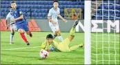  ??  ?? Players of Japan and France in action during ther FIFA U-17 World Cup football match in Guwahati on Wednesday