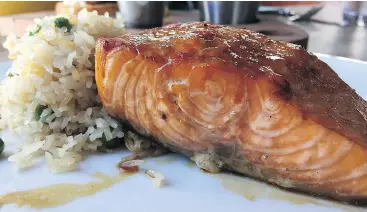  ??  ?? Cedar Plank Salmon is a Cardero’s signature dish.