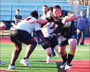  ?? Shelton High Athletics ?? Matt Weiner makes a run towards a try. The wrestling and football standout will play rugby in college.