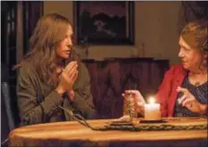  ?? A24 ?? Toni Collette, left, and Ann Dowd share a scene in “Hereditary.”