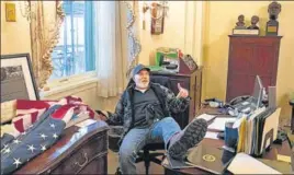  ?? AFP ?? A photo of Trump fan Richard Barnett sitting inside the office of US Speaker of the House Nancy Pelosi, at the US Capitol.