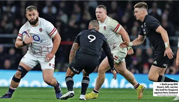 ?? David Rogers/Getty Images ?? Bath prop Will Stuart, left, carries the ball for England against New Zealand