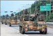  ?? AHN YOUNG-JOON / ASSOCIATED PRESS ?? ROK’s K-55 self-propelled howitzers move during an exercise in Paju near the border with the DPRK on Monday.