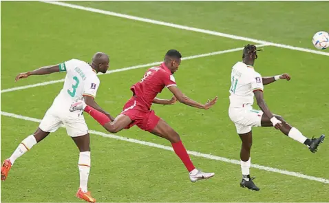  ?? ?? Senegal dump hosts, Qatar out of the ongoing FIFA World Cup in a 3- 1 win yesterday at Al Thumama Stadium ... yesterday