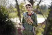  ?? MARK HUMPHREY — THE ASSOCIATED PRESS ?? Olivia Chaffin, 14, is seen in Jonesborou­gh, Tenn. Olivia is asking Girl Scouts across the country to band with her and stop selling cookies, saying, “The cookies deceive a lot of people. They think it’s sustainabl­e, but it isn’t.”