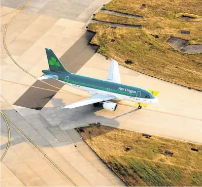  ?? PHOTO: MATTHEW LLOYD/ BLOOMBERG ?? Going the distance: Aer Lingus has vowed to make air travel as safe as possible