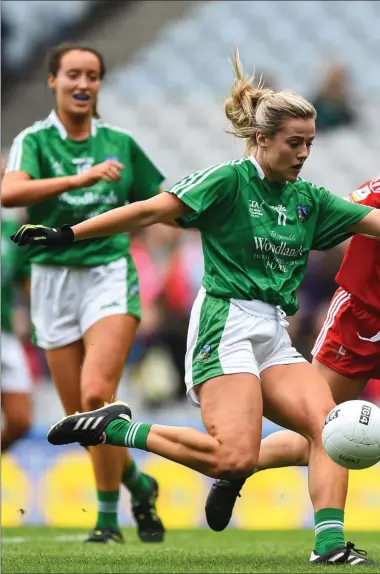  ??  ?? The Louth defence can only watch as Rebecca Delee of Limerick shoots to score her side’s second goal during the