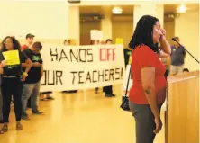  ?? Yalonda M. James / The Chronicle ?? Mary Hill, a retired Oakland teacher, gets emotional as she defends teacher Darnisha Wright during a school board meeting.