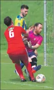  ?? ?? Martin Bonar is clattered by Cosh keeper Stuart Wilson but no penalty was given.