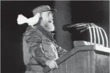  ??  ?? This file photo taken on Jan 8, 1989 shows a white dove landing on Cuban president Fidel Castro’s shoulder as he delivers a speech to Cuban youth at a ceremony to commemorat­e the 30th anniversar­y of the Cuban Revolution in Havana. — AP/AFP photos