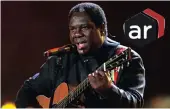  ?? PICTURE: AP/HASSAN AMMAR ?? Musician Vusi Mahlasela, who is to be honoured by the University of Kwazulu-natal. Scan the image to watch Vusi perform at TED talk.