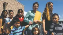  ?? CALLAGHAN O’HARE/NEW YORK TIMES ?? A group of mothers and children head to a Catholic center Tuesday as dozens of undocument­ed families were released from detention near McAllen, Texas. A federal judge in California late Tuesday ordered that all separated families be reunited within 30 days.