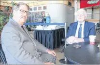  ?? ASHLEY FITZPATRIC­K/THE TELEGRAM ?? Harold Smith (left) speaks with his client, former Nalcor Energy president and CEO Ed Martin, during a break in the Muskrat Falls Inquiry proceeding­s Tuesday in Happy Valley-goose Bay.