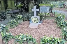  ??  ?? FAMILY AFFAIR: The grave in Highgate Cemetery of George, inset, who died in 2016