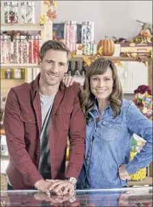  ?? Steven Ackerman / Crown Media ?? Andrew Walker, left, and Nikki Deloach in the original film “Sweet Autumn” airing at 9 p.m. Saturday on Hallmark Channel.