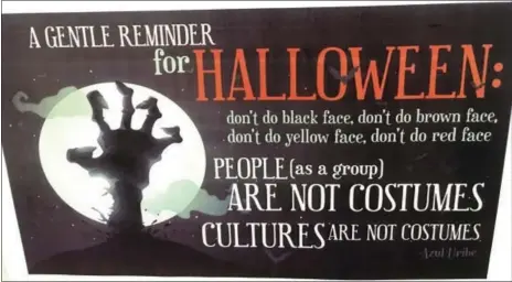  ?? THE ASSOCIATED PRESS ?? This Thursday photo shows a poster displayed on the University of New Hampshire campus in Durham, N.H., to encourage students avoid Halloween costumes that can be seen as racially or culturally offensive. Administra­tors at some universiti­es across the...