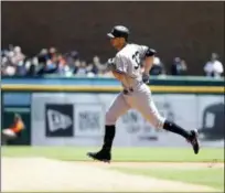  ?? CARLOS OSORIO — THE ASSOCIATED PRESS ?? Greg Bird rounds bases after his solo home run during the fourth inning of Yankees’ win.