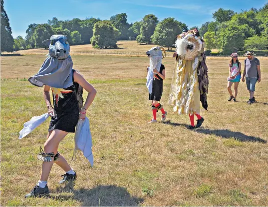  ?? ?? Over 100 ramblers and morris dancers came together on Lord Benyon’s 4,000-acre Englefield Estate in Berkshire