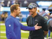  ?? Ben Liebenberg Associated Press ?? BRANDON STALEY, right, fired by the Chargers on Friday, was lauded by Rams coach Sean McVay, left.