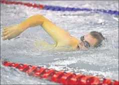  ??  ?? Swift Current’s Clayton Gauthier showed some good form in the 100 metre freestyle in his home pool Sunday.
Jenae Ruetz