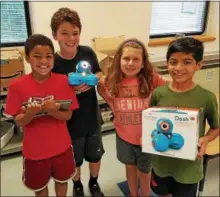  ?? SUBMITTED PHOTO ?? Zach Laurie is able to see how kids interact with the Wonder Workshop Dash robot, and he may implement it on a “larger scale in the future.”