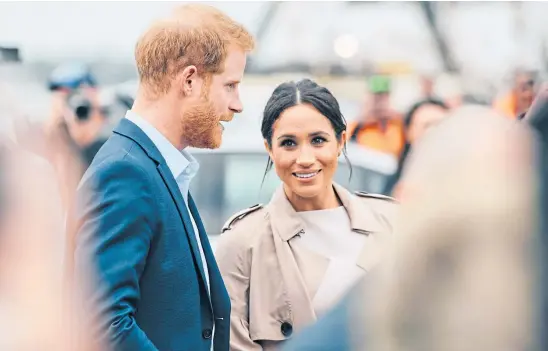  ?? ?? CROWNING GLORY: Harry and Meghan have caused rifts in the family but the Duke of Sussex says he wants to “protect” the Queen.