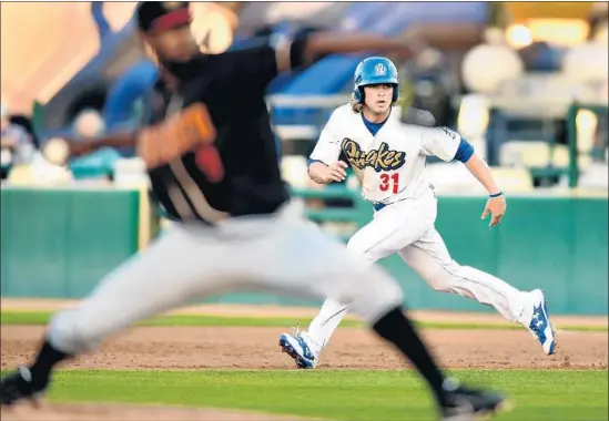  ?? Wally Skalij Los Angeles Times ?? DJ PETERS, who was the Cal League MVP last season when he played for the Rancho Cucamonga Quakes, was invited to the Dodgers’ major league camp this spring.