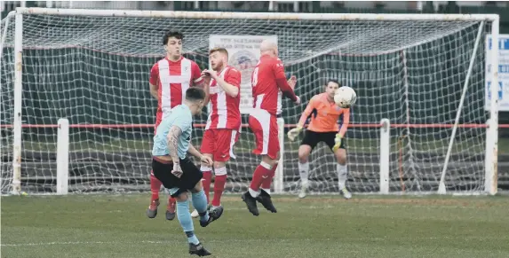  ??  ?? Seaham Red Star defend a free-kick against North Shields.